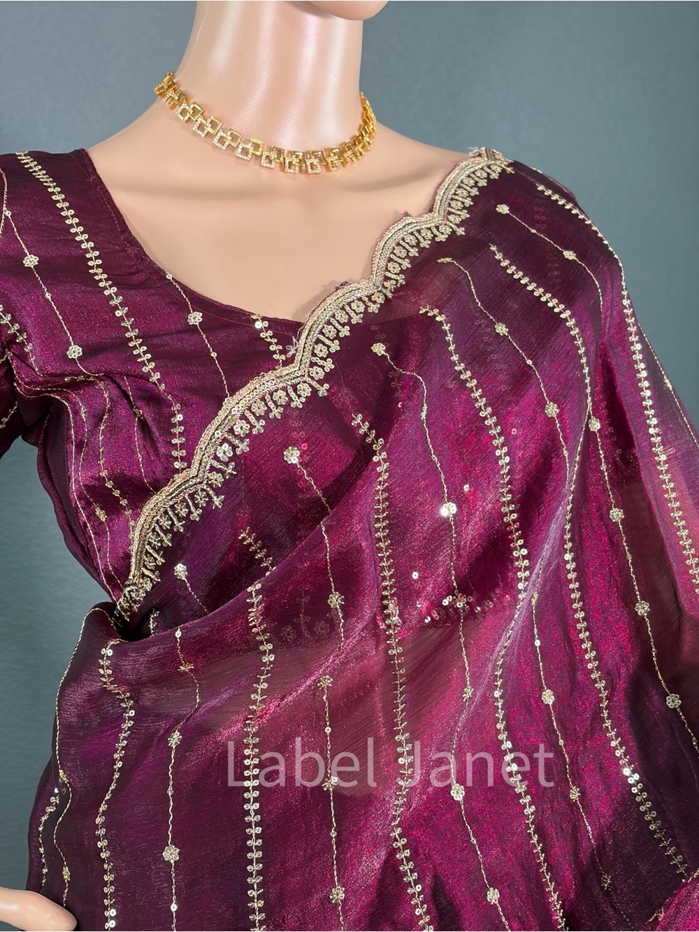 Embroidered Maroon Silk Saree with Gold Accents (Brand New)